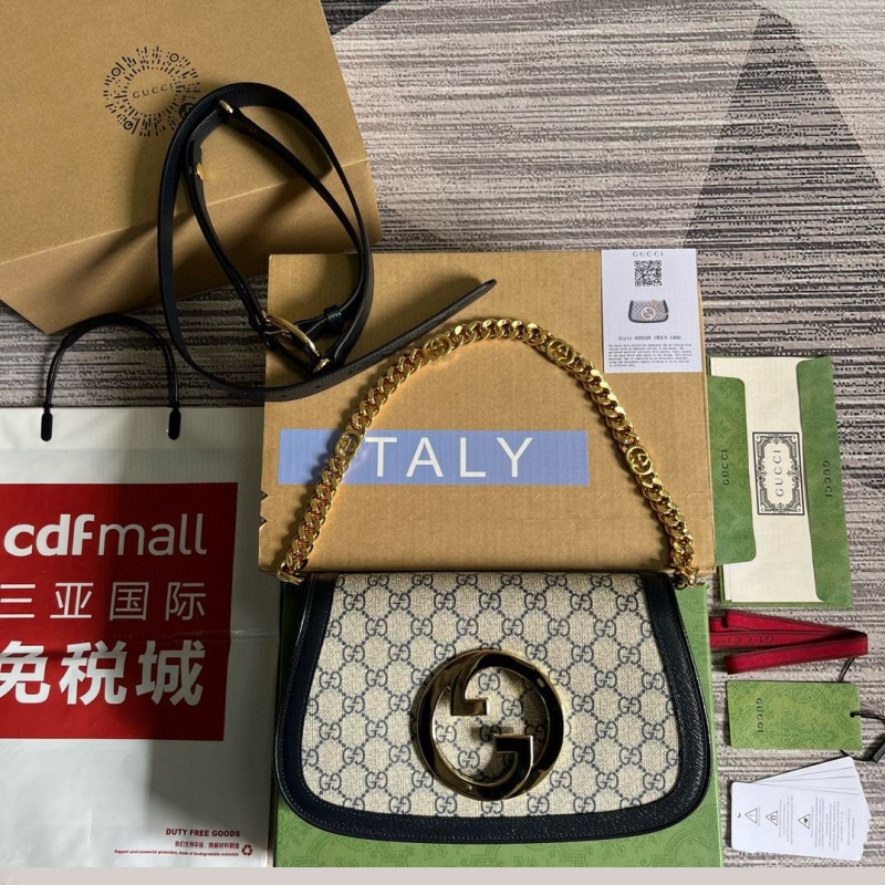 G*u*i top handle bags
